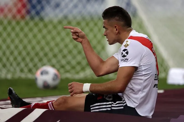 Rafael Santos Borre of Argentina's River Plate reacts after being fouled by goalkeeper Marcos Felipe of Brazil's Fluminense during a Copa Libertadores soccer match in Rio de Janeiro, Brazil, Thursday, April 22, 2021. (Photo by Silvia Izquierdo/AP Photo/Pool)