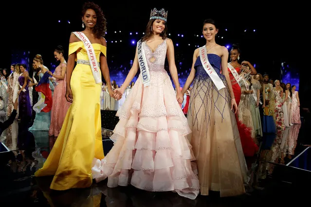 Winner of Miss World Miss Puerto Rico Stephanie Del Valle (C) stands with first runner up Miss Dominican Republic Yaritza Miguelina Reyes Ramirez (L) and second runner up Miss Indonesia Natasha Mannuela during the Miss World 2016 Competition in Oxen Hill, Maryland, U.S., December 18, 2016. (Photo by Joshua Roberts/Reuters)