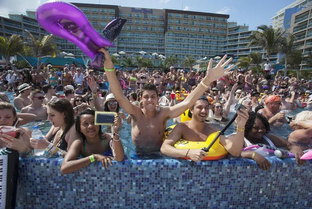 Spring breakers gather at a pool party at a hotel in Cancun March 8, 2015. (Photo by Victor Ruiz Garcia/Reuters)