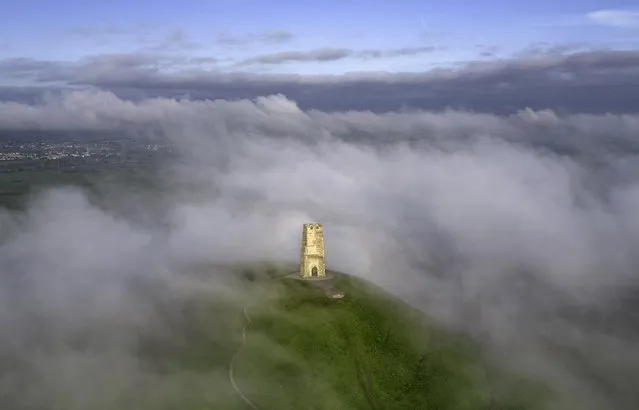 A foggy start to the day today at Glastonbury Tor in Somerset, South West England on May 7, 2023. (Photo by Mike Jefferies/Picture Exclusive)