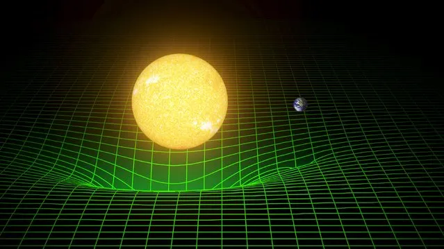 A computer simulation shows how our sun and Earth warp space and time, or spacetime, represented here with a green grid in this image released in Washington February 11, 2016. Scientists have for the first time detected gravitational waves, ripples in space and time hypothesized by Albert Einstein a century ago, in a landmark discovery announced on Thursday that opens a new window for studying the cosmos. (Photo by Reuters/Caltech/MIT/LIGO Laboratory)