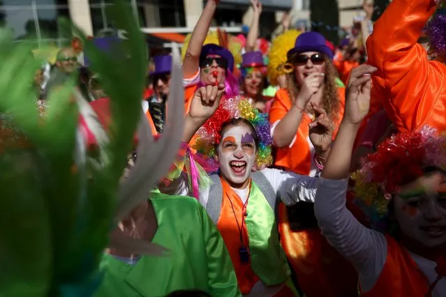 Revellers participate in a carnival parade in the coastal city of Limassol, Cyprus March 13, 2016. (Photo by Yiannis Kourtoglou/Reuters)