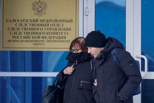 Lyudmila Navalnaya, the mother of late Russian opposition leader Alexei Navalny, and his lawyer Alexei Tsvetkov walk out of an office of the Investigative Committee's regional department in the city of Salekhard in the Yamal-Nenets Region, Russia, on February 19, 2024. (Photo by Maxim Shemetov/Reuters)