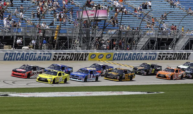 Austin Dillon (33) leads the field at the start o the NASCAR Xfinity series auto race at Chicagoland Speedway, Sunday, June 21, 2015, in Joliet, Ill. (AP Photo/Nam Y. Huh) 