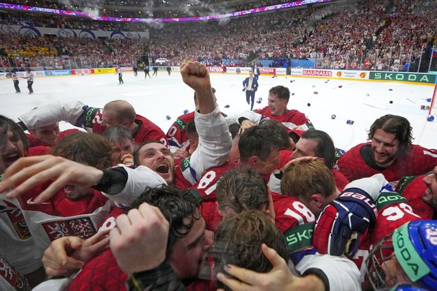 Members of the Czech Republic team celebrates after they defeated Switzerland 2-0 in a gold medal match at the Ice Hockey World Championships in Prague, Czech Republic, Sunday, May 26, 2024. (Photo by Petr David Josek/AP Photo)