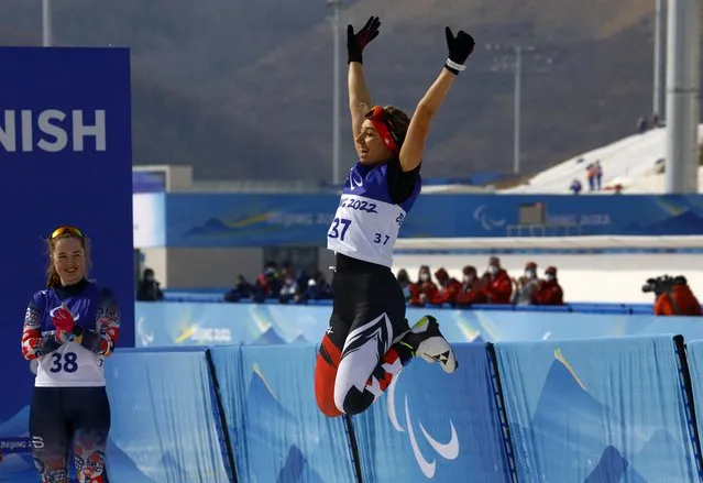 Gold medal winner Natalie Wilkie of Team Canada celebrates following the Women's Sprint Free Technique Standing Final on day five of the Beijing 2022 Winter Paralympics at Zhangjiakou National Biathlon Centre on March 09, 2022 in Zhangjiakou, China. (Photo by Gonzalo Fuentes/Reuters)