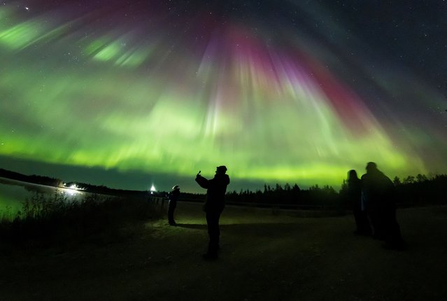 A view of northern lights over the skies of Sodankyla, Lapland, Finland, on October 7, 2024. (Photo by Alexander Kuznetsov/Courtesy of All About Lapland/Handout via Reuters)