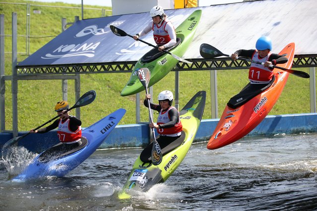 (L-R) Serhii Sovko of Ukraine, Isak Ohrstrom of Sweden, Felix Oschmautz of Austria, and Bradley Forbes-Cryans of Britain in action during the men's extreme CSLX race of the Canoe Slalom World Cup in Krakow, southern Poland, 19 June 2022. (Photo by Lukasz Gagulski/EPA/EFE)