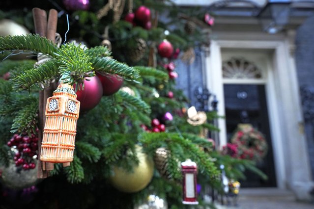 A Christmas tree decoration in the shape of Big Ben hangs on the tree in Downing Street in London, Tuesday, November 28, 2023. (Photo by Kirsty Wigglesworth/AP Photo)