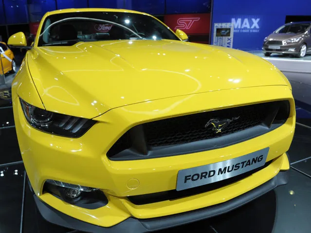 A Ford Mustang 2015 is displayed at the 2014 Paris Auto Show on October 2, 2014 in Paris, on the first of two press days. (Photo by Eric Piermont/AFP Photo)