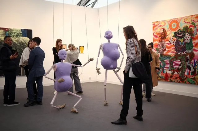 Visitors attend the annual Frieze London Art Fair in London, Britain on October 12, 2022. (Photo by Henry Nicholls/Reuters)