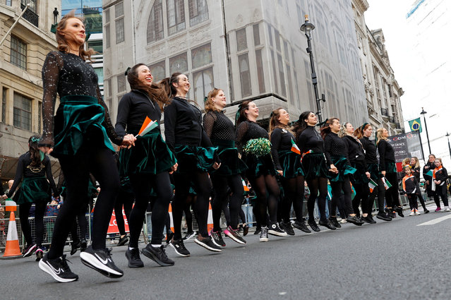 People take part in St Patrick's Festival parade in London, on March 16, 2025. (Photo by Carlos Jasso/Reuters)