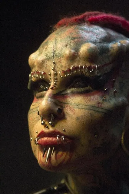 Mexican body modification and tattoo artist "Vampire Woman”, poses during the last day of the Quito Tattoo Convention in Quito, Ecuador September 27, 2015. (Photo by Guillermo Granja/Reuters)