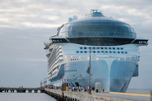 Tourists leave the Royal Caribbean's Icon of the Seas, the largest cruise ship in the world, after arriving at Costa Maya Cruise Port, in the village town of Mahahual, Quintana Roo state, Mexico, on February 6, 2024. (Photo by Paola Chiomante/Reuters)