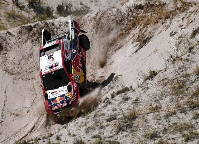 Toyota' s driver Nasser Al- Attiyah of Qatar and his co- driver Matthieu Baumel of France compete during the Stage 10 of the Dakar 2018 between Salta and Belen, Argentina, on January 16, 2018. (Photo by Franck Fife/AFP Photo)