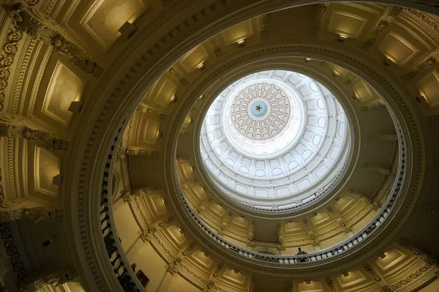 Visitors walk along the balconies of the Texas Capitol rotunda in Austin, Texas, Monday, January 9, 2023. The 88th Texas Legislative Session will begin Tuesday. (Photo by Eric Gay/AP Photo)