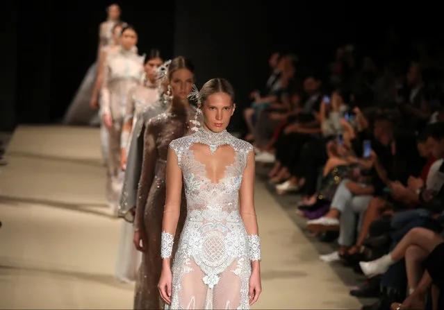 A model presents a creation by Peruvian designer Anais Samanez during Lima Fashion Week in Lima, Peru, April 24, 2018. (Photo by Guadalupe Pardo/Reuters)