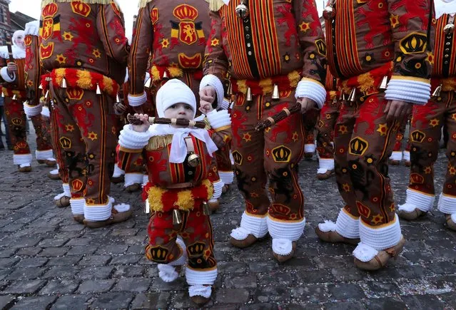 Chirico Largo, 2 years and 7 months old, one of the youngest Gilles of Binche, takes part in a parade during the Binche carnival, a UNESCO World Heritage event in Binche, Belgium February 25, 2020. (Photo by Yves Herman/Reuters)