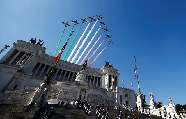 The Italian Frecce Tricolori aerobatic squad performs over the Vittoriano monument during the Republic Day military parade in Rome, Italy June 2, 2018. (Photo by Tony Gentile/Reuters)