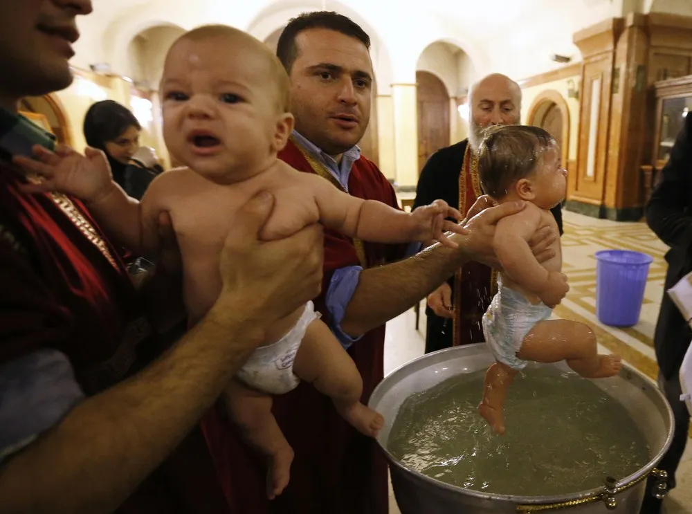 A Mass Baptism Ceremony on Epiphany Day in Georgia