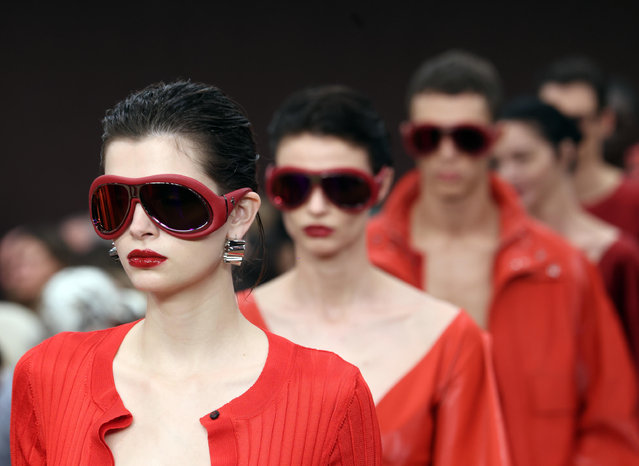 Models present creations for the Ferrari show during the Milan Fashion Week Spring/Summer 2025, in Milan, Italy, 21 September 2024. The Milano Moda Donna SS 2025 runs from 17 to 23 September. (Photo by Matteo Bazzi/EPA/EFE)