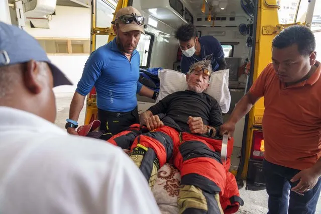 Spanish climber Carlos Soria, arrives at the Hams hospital after being rescued from Dhaulagiri mountain region in Kathmandu, Nepal, Thursday, May 18, 2023. The 84-year-old climber attempting to become the oldest person to summit all the world's highest peaks was rescued Thursday after he was injured. Soria was attempting to scale Mount Dhaulagiri but was hurt on his way to the top. (Photo by Niranjan Shrestha/AP Photo)