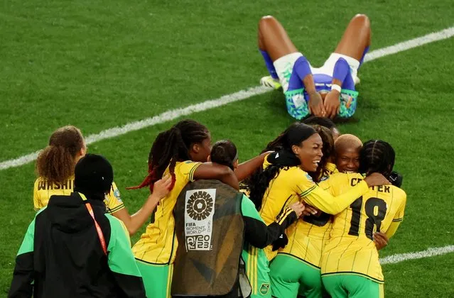 Jamaica's Trudi Carter celebrates with teammates after the match as Jamaica qualify for the knockout stages of the World Cup after defeating Brazil at the FIFA Women's World Cup Australia & New Zealand 2023 at Melbourne Rectangular Stadium on August 02, 2023. (Photo by Asanka Brendon Ratnayake/Reuters)