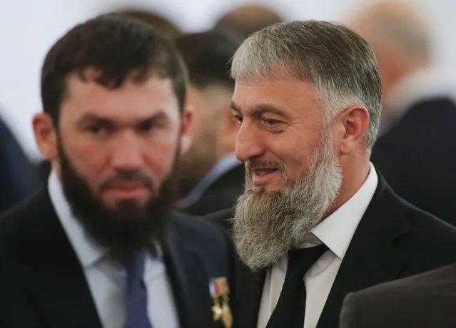 Adam Delimkhanov (R), Russian State Duma lower house of parliament member, and Magomed Daudov, the speaker of the Chechen parliament, wait before an annual state of the nation address attended by Russian President Vladimir Putin at the Kremlin in Moscow, Russia, December 1, 2016. (Photo by Maxim Shemetov/Reuters)