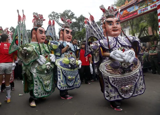 Artists from Taiwan  perform during the people's party and Chinese Cap Go Meh festival on a street in Bogor, Indonesia, 05 March 2015. Chinese-Indonesians across the country celebrate Cap Go Meh on the 15th day in the first month of the Chinese lunar New Year.  EPA/ADI WEDA