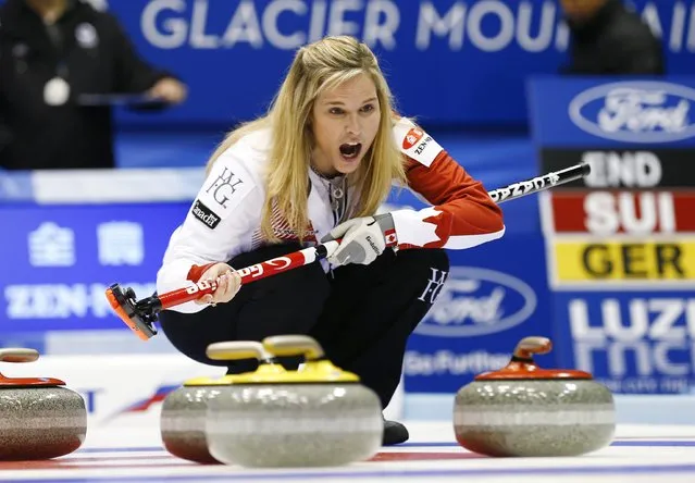 Canada's skip Jennifer Jones instructs her team mates during their curling round robin game against Scotland at the World Women's Curling Championships in Sapporo March 15, 2015. (Photo by Thomas Peter/Reuters)