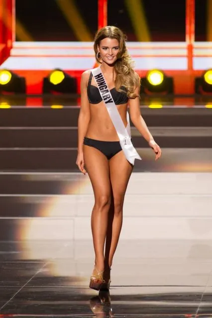 A handout picture provided by the Miss Universe Organization shows Rebeka Karpati, Miss Hungary 2013, competing in the swimsuit competition during the Preliminary Competition at the Crocus City Hall, in Moscow, Russia, 05 November 2013. (Photo by Darren Decker/EPA)