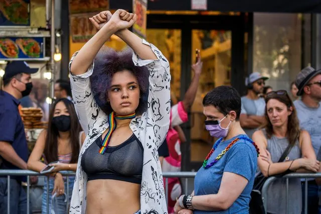 A person gestures during the “NYC Dyke March” have a moment of silence for the LGBT community in Manhattan in New York City, New York, U.S., June 26, 2021. (Photo by David Dee Delgado/Reuters)