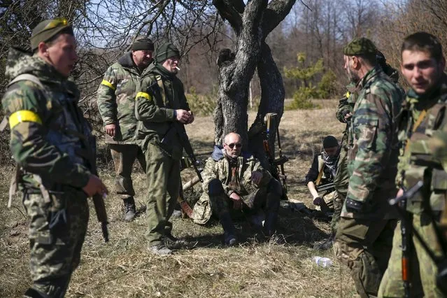 Members of the Ukrainian Defence Ministry's assault battalion “Aydar” have a rest during a military drill near Zhytomyr April 9, 2015. (Photo by Valentyn Ogirenko/Reuters)