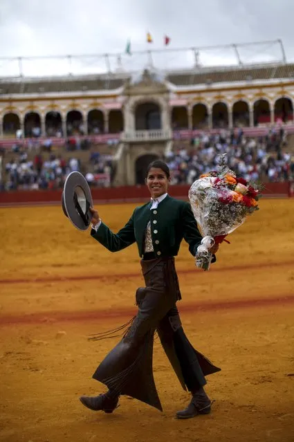 French rejoneadora (mounted bullfighter) Lea Vicens celebrates her performance during a bullfight at The Maestranza bullring in the Andalusian capital of Seville, southern Spain April 26, 2015. (Photo by Marcelo del Pozo/Reuters)