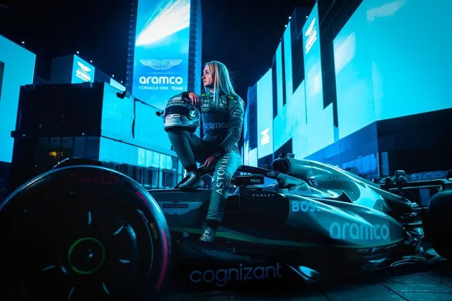 In this handout photo supplied by Aston Martin Aramco F1 Team, Jessica Hawkins poses with the Aston Martin Aramco Formula One® Team AMR22 at a demonstration event on Riyadh Boulevard on March 5, 2024 in Riyadh, Saudi Arabia. (Photo by Conor McDonnel/Aston Martin Aramco F1 Team via Getty Images)