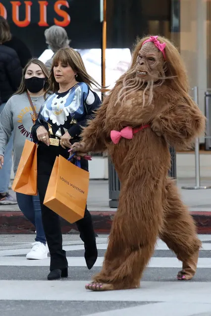 Paula Abdul proves she's still got the moves as she films a commercial on trendy Rodeo Drive in Beverly Hills on November 9, 2021. The former American Idol judge was seen strutting across the busy road alongside someone in an ape costume and another in a sloth costume. (Photo by Backgrid USA)