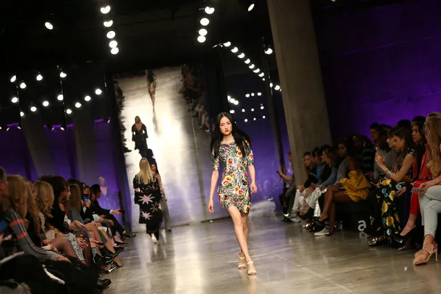 A model presents a creation at the Topshop Unique catwalk show during London Fashion Week in London, Britain February 19, 2017. (Photo by Neil Hall/Reuters)