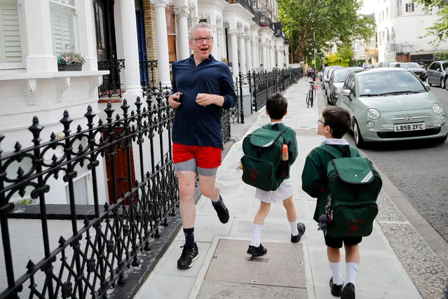 Britain's Environment, Food and Rural Affairs Secretary Michael Gove jogs in London on June 18, 2019. The six contenders left in the race to replace Theresa May as Britain's prime minister are scrambling for votes as the second ballot of the 313 Conservative MPs takes place today. (Photo by Tolga Akmen/AFP Photo)