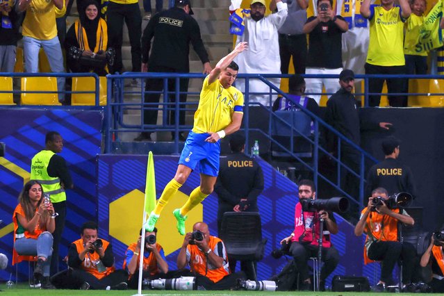 Nassr's Portuguese forward #07 Cristiano Ronaldo celebrates scoring his team's fist goal during the Saudi Pro League football match between Al-Nassr and Al-Wehda at Al-Awwal Stadium in Riyadh on May 4, 2024. (Photo by Fayez Nureldine/AFP Photo)