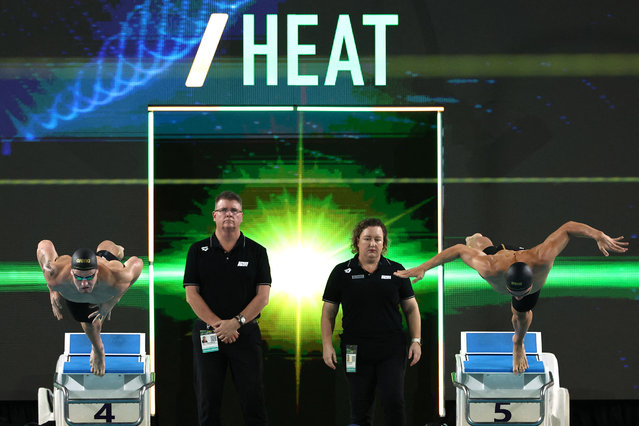 Australia's Samuel Williamson (L) and Joshua Collett (R) compete in the men's 100m breaststroke heats during the Australian Swimming Trials at the Brisbane Aquatic Centre on June 10, 2024. (Photo by David Gray/AFP Photo)