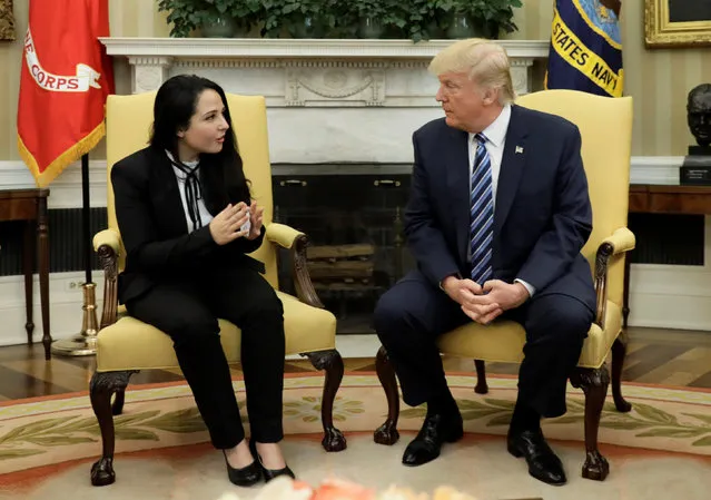 Aya Hijazi, an Egyptian-American woman detained in Egypt for nearly three years on human trafficking charges, meets with U.S. President Donald Trump in the Oval Office of the White House in Washington, U.S., April 21, 2017. (Photo by Kevin Lamarque/Reuters)