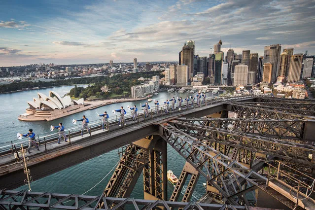 The Sydney Harbour Bridge and the Australian Academy of Tai Chi and Qigong hosts the first Tai Chi martial arts class over Australia's largest city, May 2, 2017. (Photo by Reuters/BridgeClimb Sydney)