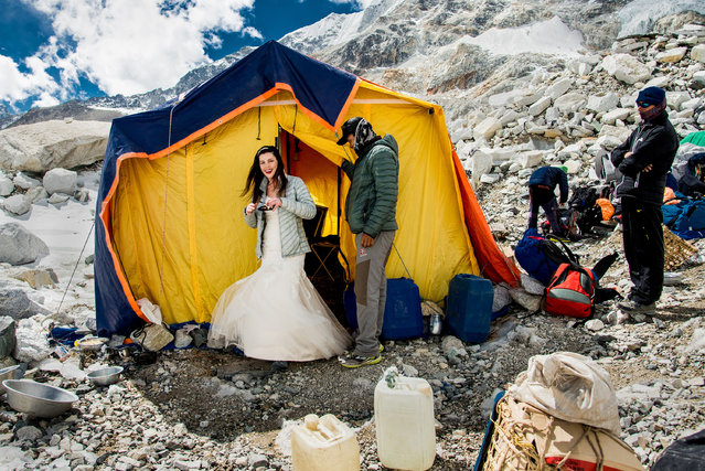 James Sissom and Ashley Schmieder exchange vows on Everest. (Photo by Charleton Churchill/Caters News Agency)