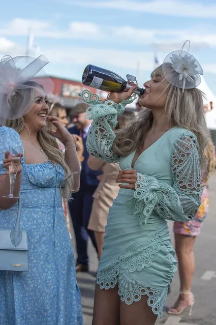 Ladies enjoying Ladies Day at the Grand National Festival 2022 at Aintree Racecourse, Liverpool on Friday, April 8, 2022. (Photo by Splash News and Pictures)