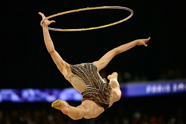 Spain's Polina Berezina as she competes in the rhytmic gymnastics' individual all-around qualification during the Paris 2024 Olympic Games at the Porte de la Chapelle Arena in Paris, on August 8, 2024. (Photo by Loic Venance/AFP Photo)