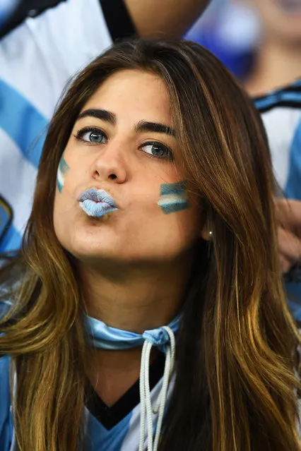 An Argentina fan blows a kiss during the 2014 FIFA World Cup Brazil Group F match between Argentina and Bosnia-Herzegovina at Maracana on June 15, 2014 in Rio de Janeiro, Brazil. (Photo by Matthias Hangst/Getty Images)