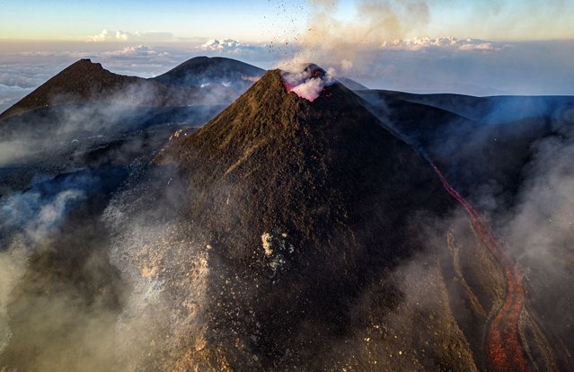 A drone view shows lava rising from a crater of Mount Etna, Europe's most active volcano, Italy on July 2, 2024. (Photo by Giuseppe Di Stefano/Etna Walk via Reuters)