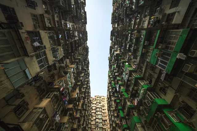 Colorful block of apartments in Hong Kong. (Photo by Peter Stewart/Caters News)