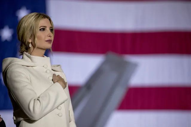 Ivanka Trump, the daughter of President Donald Trump, stands on stage during the playing of the National Anthem before President Donald Trump signs the National Defense Authorization Act for Fiscal Year 2020 at Andrews Air Force Base, Md., Friday, December 20, 2019, before traveling to Mar-a-lago in Palm Beach, Fla. (Photo by Andrew Harnik/AP Photo)