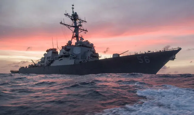 In this January 22, 2017, photo provided by U.S. Navy, the USS John S. McCain conducts a patrol in the South China Sea while supporting security efforts in the region. The guided-missile destroyer collided with a merchant ship on Monday, August 21, in waters east of Singapore and the Straits of Malacca. (Photo byJames Vazquez/U.S. Navy via AP Photo)